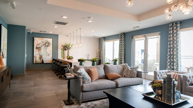 black-wooden-coffee-table-near-white-couch-1 - Real Living Estates House Interior